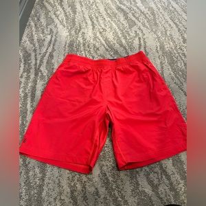 Rhône 9 inch unlined shorts red